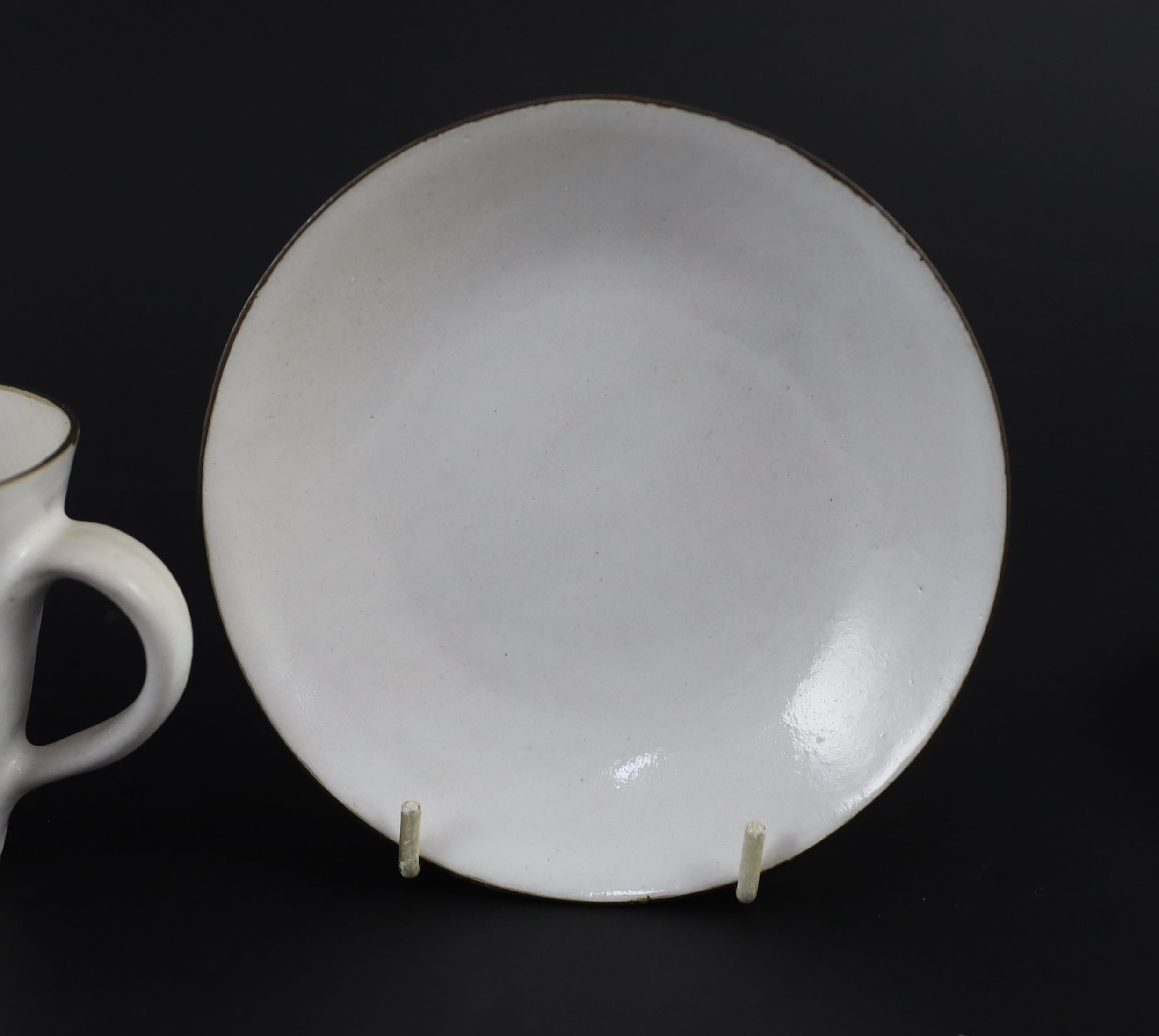 Dame Lucie Rie (1902-1995) a cup, saucer and side plate, c.1959, Cup 8.1 cm high